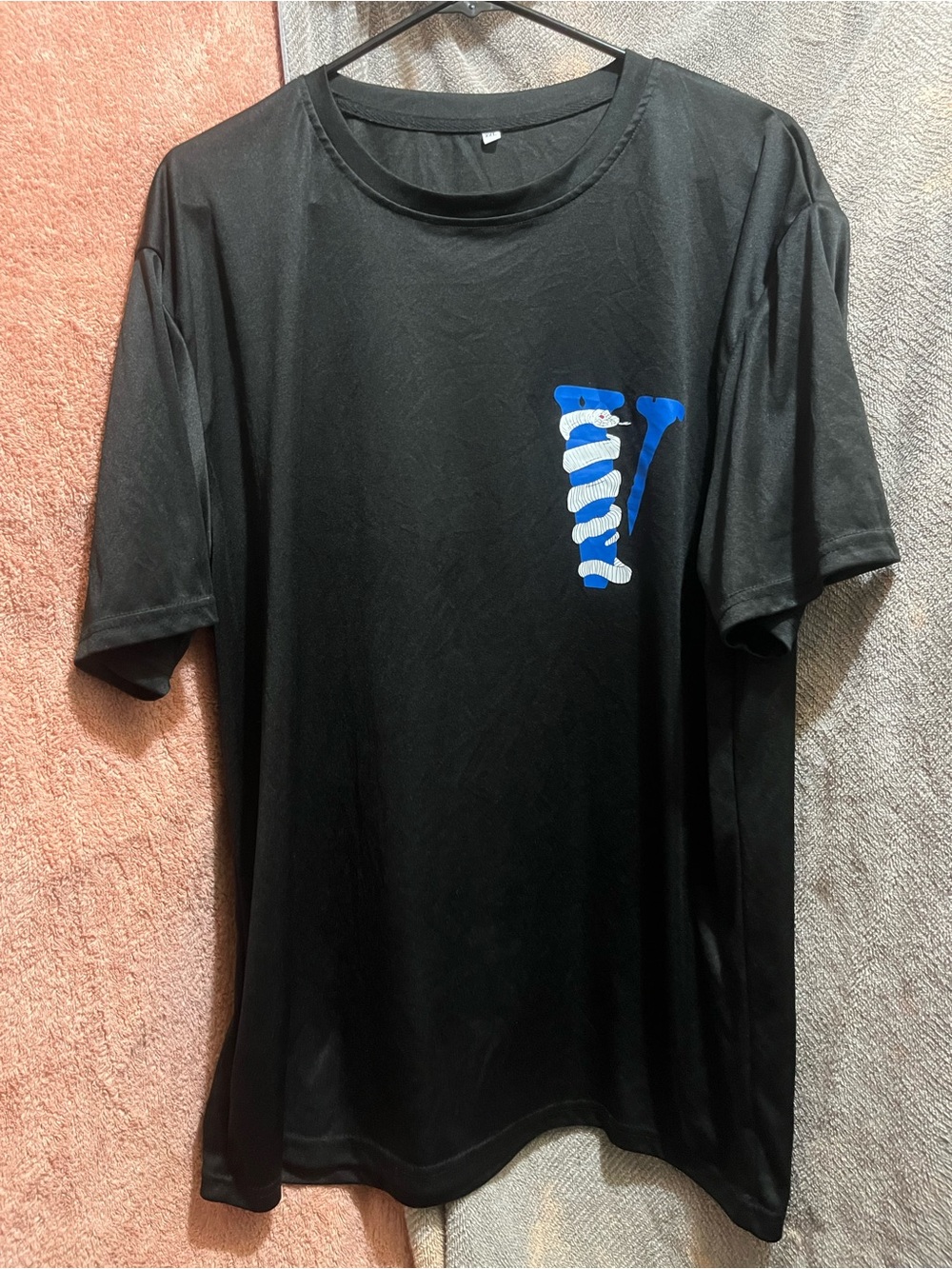 Men's Black Graphic Tee with Blue Accent